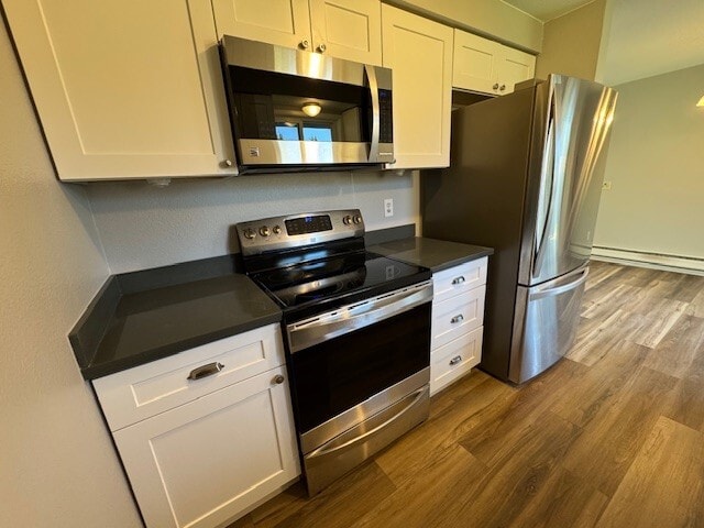 Stainless steel appliances in a galley kitchen - 6125 138th St SE