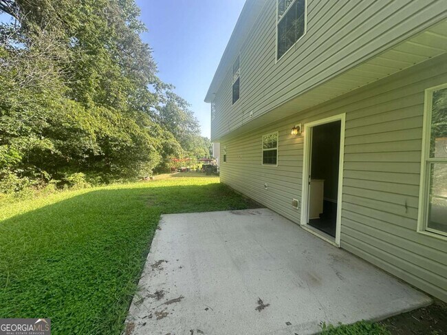 Building Photo - 7467 Petunia Dr