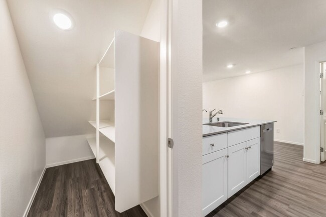 Building Photo - Modern West Henderson Townhome with Sleek Upgrades & Smart Home Features!