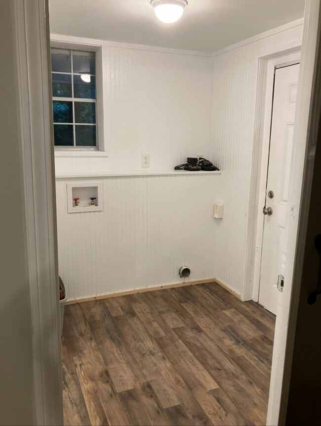 Laundry Room w/half bath & storage - 1159 Brookwood Dr