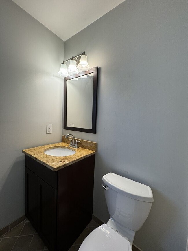 Building Photo - Introducing a charming Colonial style home...