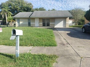 Building Photo - Beautiful home with fenced in backyard!