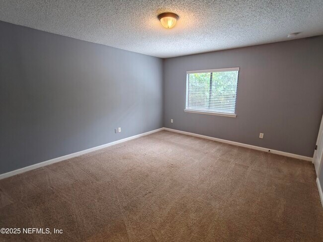 Building Photo - 7764 Playschool Ln
