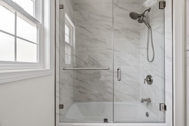 Brand new ensuite master bath glass enclosed shower tub combo - 2451 22nd St