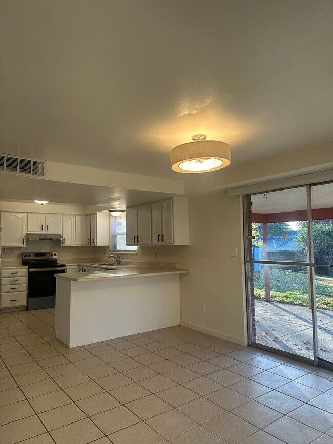 Building Photo - Welcome to this beautiful 4-bedroom, 2.5-b...