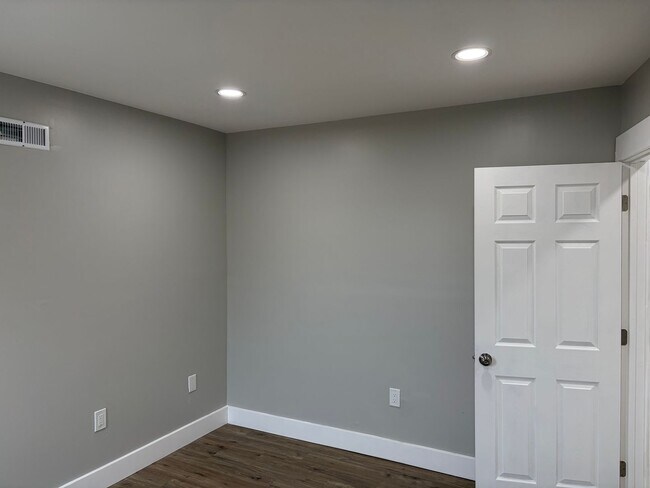 Building Photo - Newly Renovated 2- Story Townhome with Front Porch and Back Yard