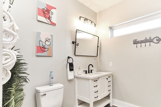 Building Photo - Fully Furnished 2BD Duplex in the Heart of...
