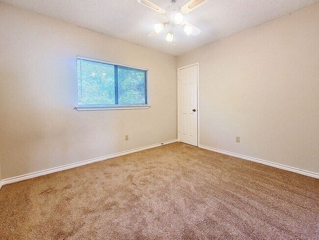 Building Photo - Warm & Inviting 4BR / 2.5BA Home with Covered Deck and 2-Car Garage