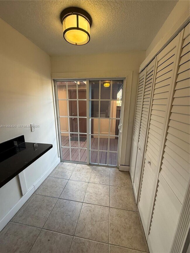 Building Photo - 9986 Royal Palm Blvd