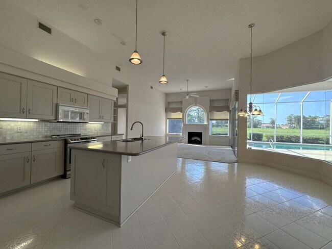 Building Photo - 4/3 Pool Home in Pelican Bay
