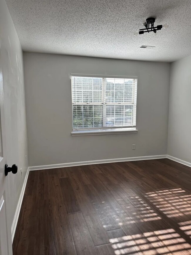 Building Photo - Updated Condo off New Garden Road - Wood B...