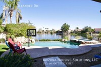 Building Photo - Beautiful Home with Pool and Lake Views in...