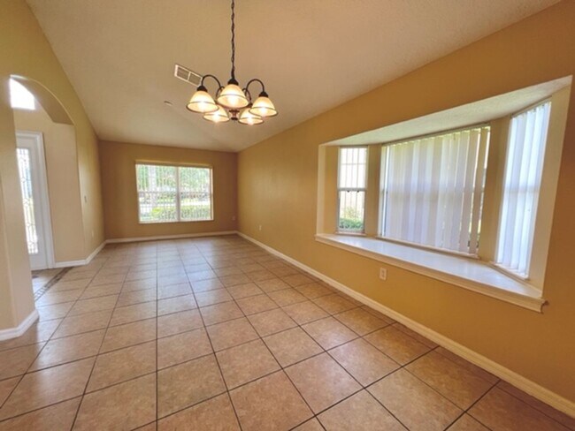 Building Photo - EAGLE CREEK LAKE NONA! WELCOME HOME! Beautiful water views! Spacious 2 story-3 bedroom 2.5 bath h...