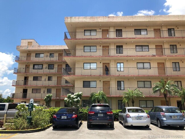 Building Photo - 9917 W Okeechobee Rd