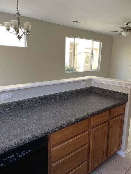 kitchen counter to livingroom view. - 6501 San Antonio Dr NE
