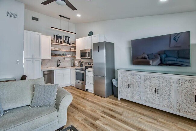 Building Photo - 50% off first months rent.  Gulf front com...