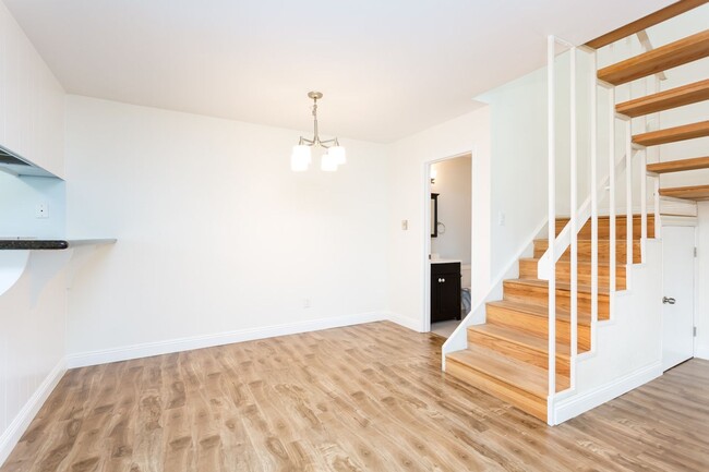 Building Photo - Beautiful bright and open Townhome at La J...