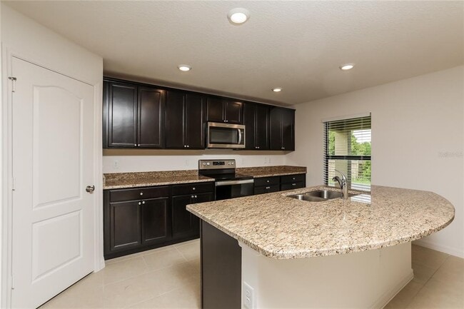 Building Photo - 35665 Rose Moss Ave