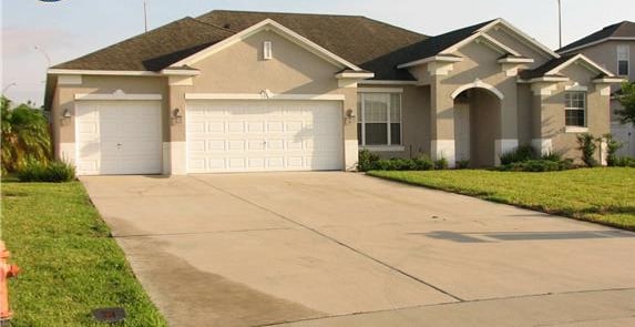 Primary Photo - Spacious 4-Bedroom Pool Home with 3-Car Ga...