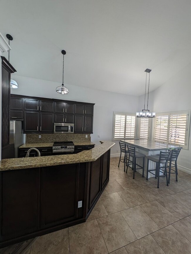 Building Photo - BEAUTIFUL executive style home w/ entertainer's dream backyard!