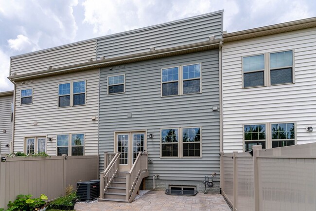 Building Photo - Townhouse with 1-Car Garage, Rooftop Deck ...