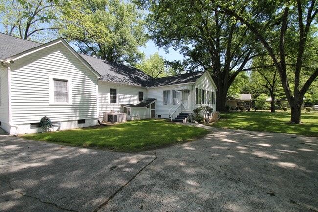 Building Photo - Exclusively Offered By Muse Realty Rentals, LLC