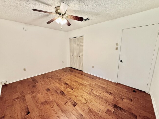 Building Photo - Charming 3BR/2BA Brick Home in Perkins Village – Spacious Yard & Cozy Fireplace