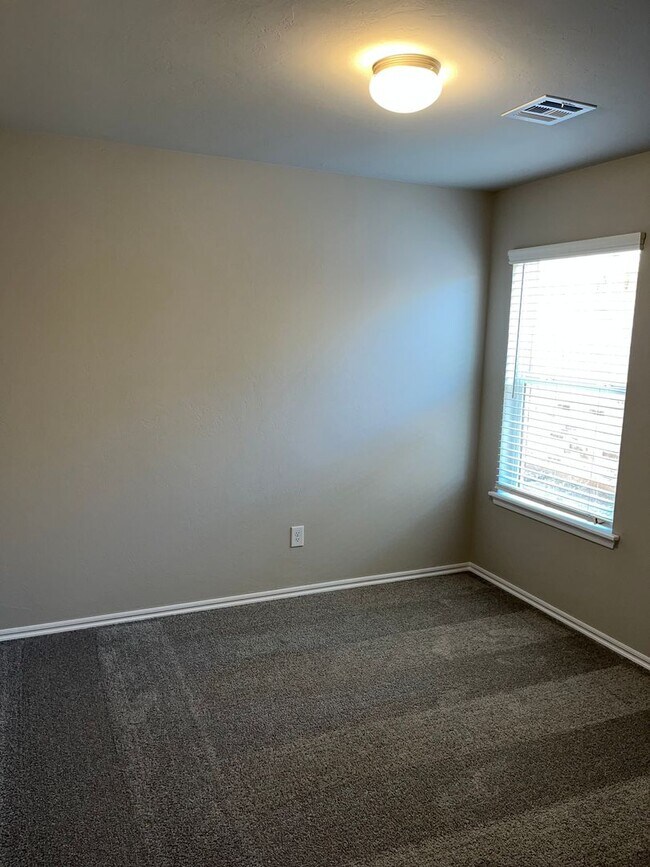 Building Photo - First Month Free! Nearly new home - built ...