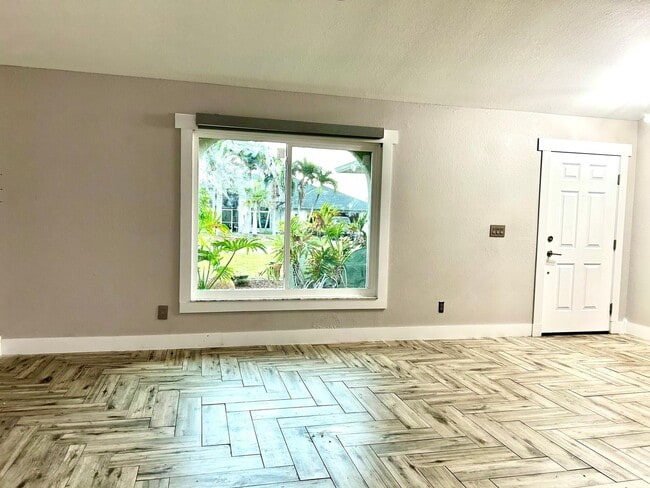 Building Photo - You will LOVE the beauty of this newly remodeled 3/2/2 pool home!