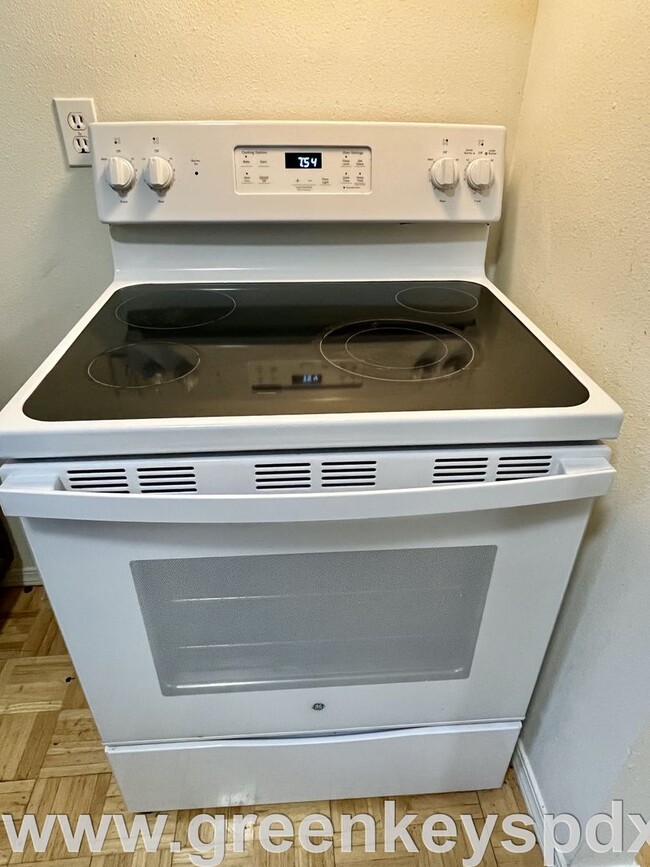 Building Photo - This 3-bedroom 1-bathroom house has a large front yard and a mostly fenced backyard.