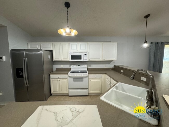 Building Photo - Solar Energy in desirable Hidden Shores of Gulf Breeze Neighborhood!