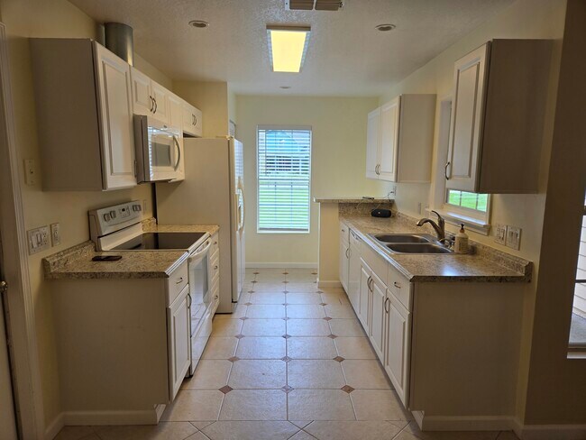 Building Photo - 573 Serenade Cir E