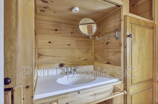 Building Photo - 573 Singing Pines Rd