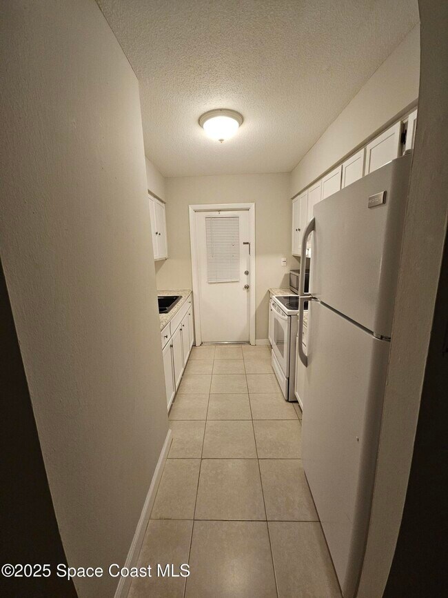 Building Photo - 8401 N Atlantic Ave