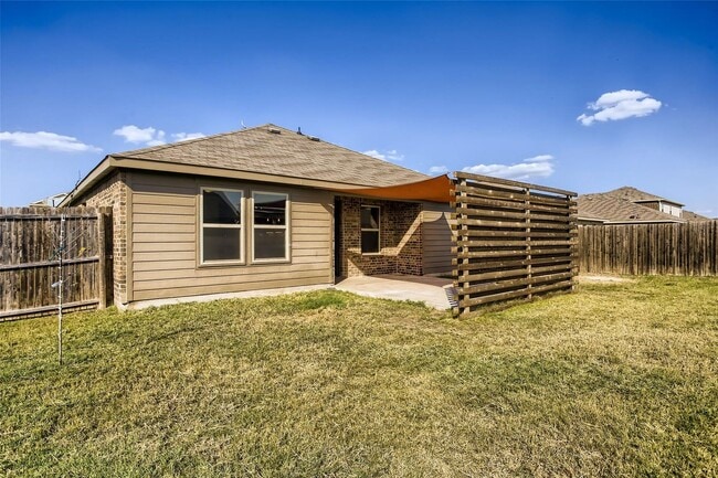 Building Photo - This well-maintained 4 bedroom home is located in a quiet neighborhood that has a community park ...