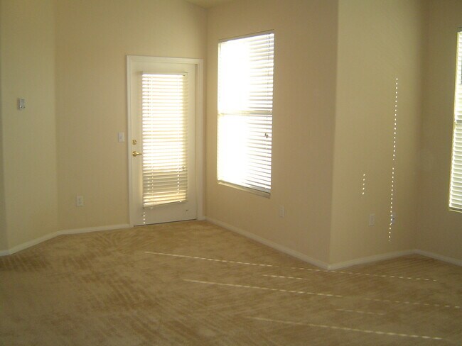 Building Photo - Move-In Ready Condo with Private Balcony & Modern Upgrades