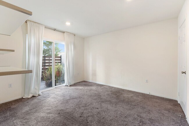 Building Photo - Modern Tri-Level Townhome in Gated Gardena Community with 2-Car Garag