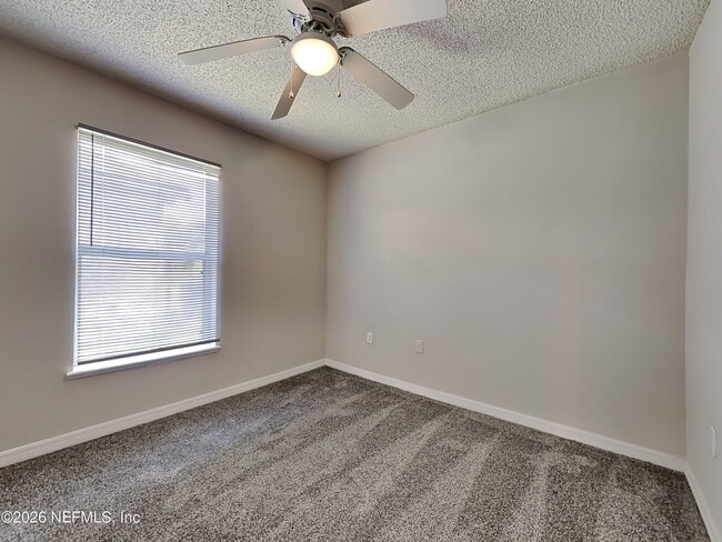 Building Photo - 6637 Gentle Oaks Dr E