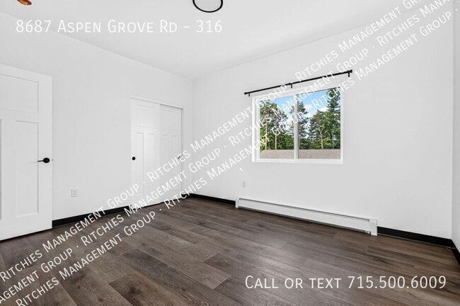 Building Photo - 8687 Aspen Ln