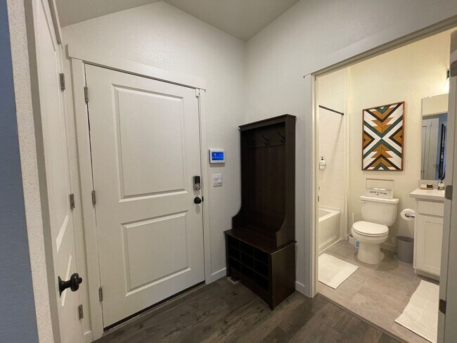 Building Photo - Live Lavishly in Harmony Ridge- Fully Furnished 5-Bedroom Dream Home with Backyard Oasis & Speake...