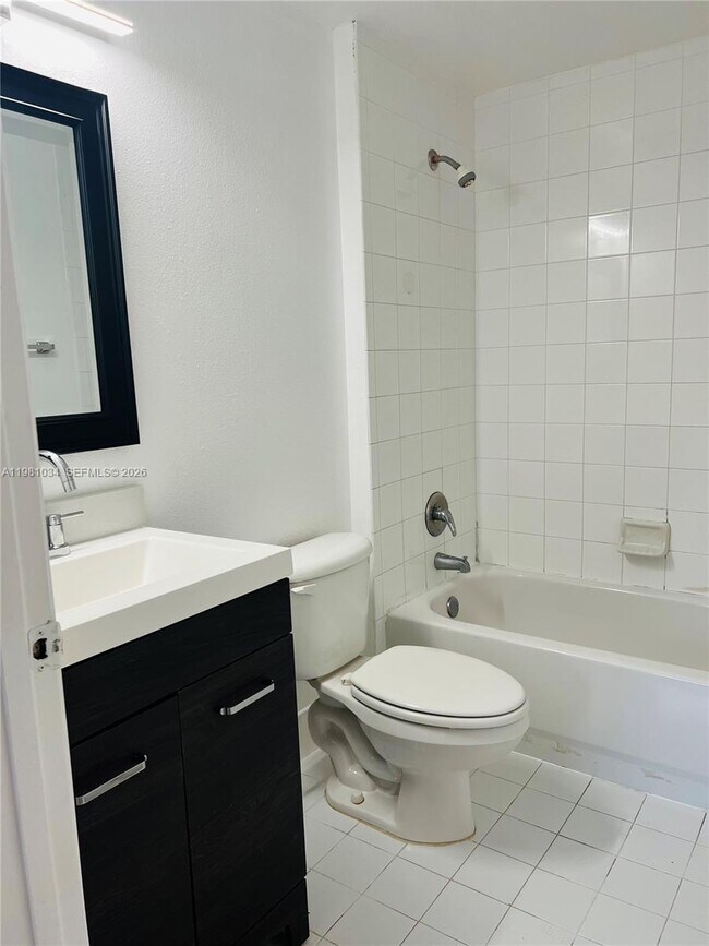 Building Photo - 3221 Sabal Palm Manor