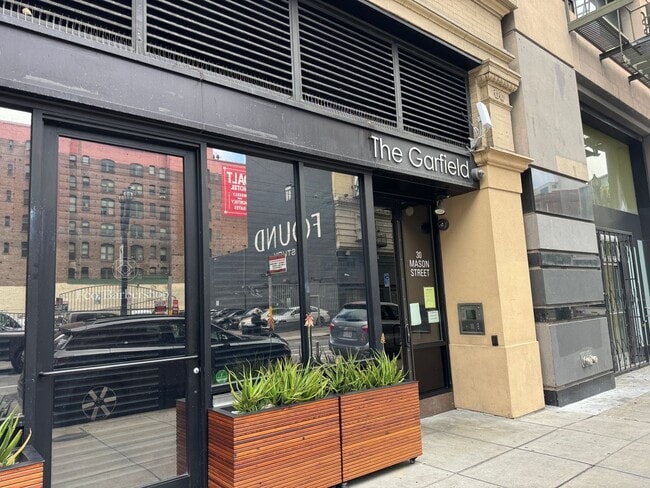 Primary Photo - Modern 1-Bedroom Condo in the historic Gar...