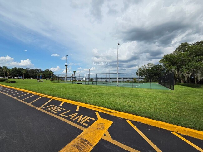 Building Photo - Lakefront First-Floor Condo in Camelot by ...