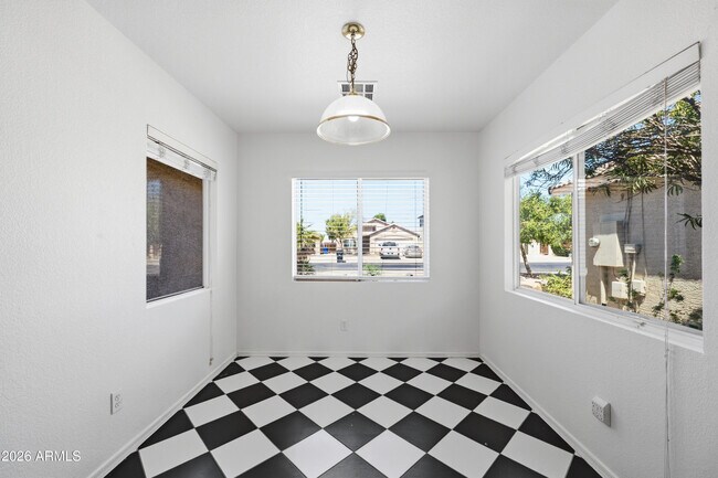 Building Photo - 10469 W Granada Rd