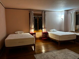 Large bedroom, East window, Curtains, mini blinds. - 2615 Parker St