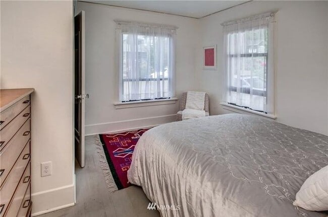 Building Photo - Timeless Charm Meets Thoughtful Updates in This Light-Filled Retreat