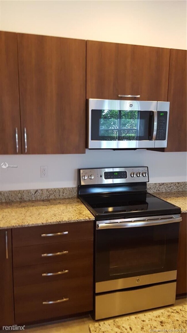 Building Photo - 3 br, 2.5 bath Townhome - 12453 NW 17th Mnr