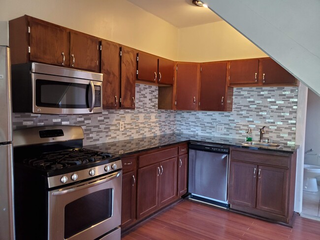 Kitchen with new appliances - 95 W 1st Ave