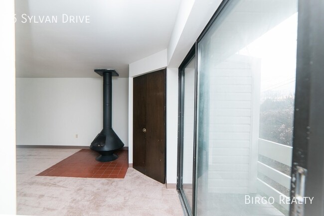 Building Photo - Warm up next to the fire in this 2 bedroom...