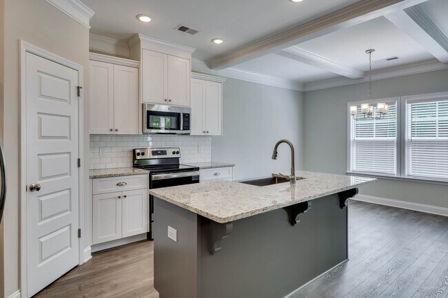 Building Photo - Beautifully maintained 4 / 2.5 home in Joh...